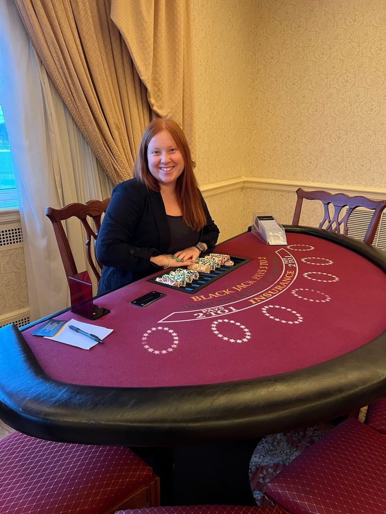 A dealer at a table.