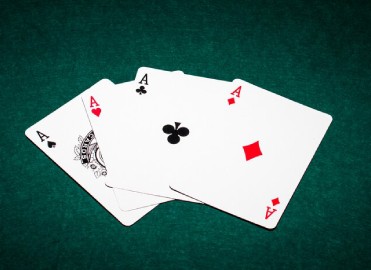 playing cards at a casino-themed corporate event.