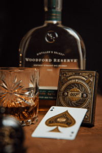 A deck of Bond-themed playing cards and alcohol
