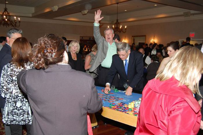 Attendees at a corporate casino themed event